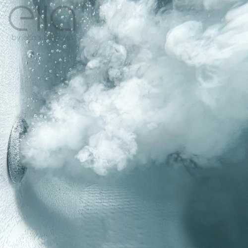 Close-up of microbubble jet releasing dense cloud of fine bubbles