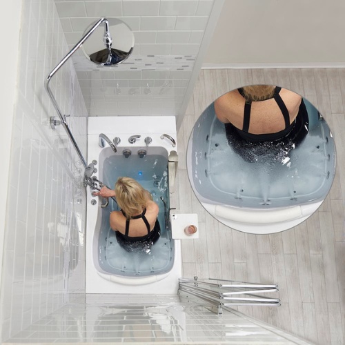 Woman using a compact walk-in tub in a tiled bathroom